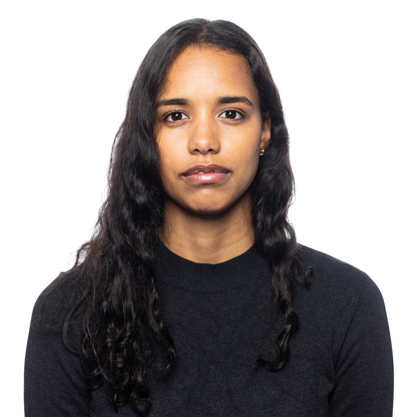 Professional headshot of a business woman on a neutral background